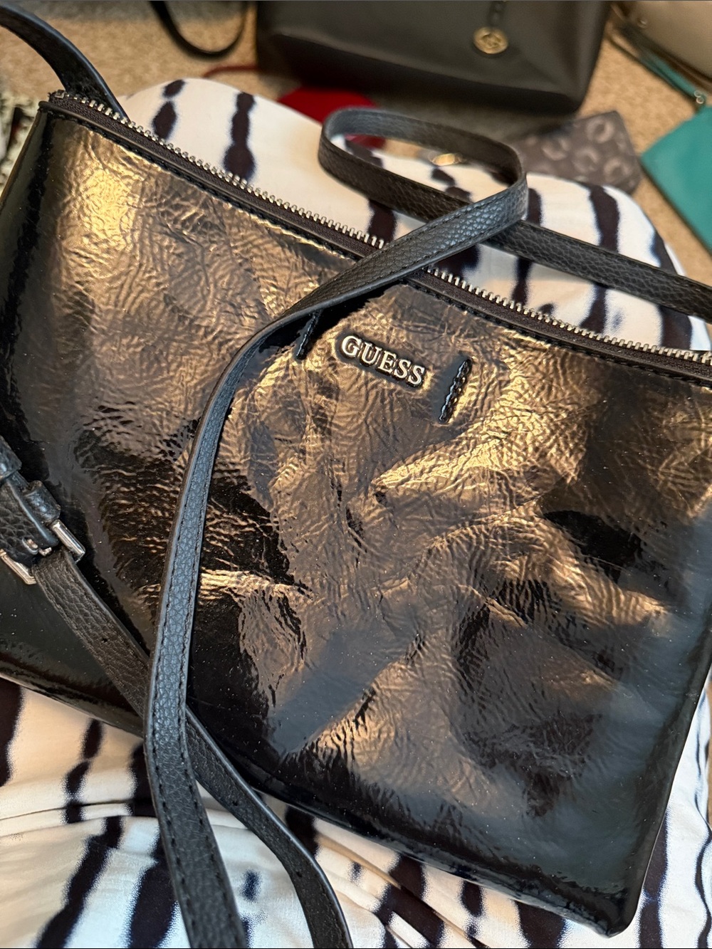 GUESS Black Patent Leather Crossbody Bag with Gold Logo